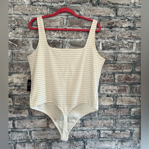 Express NWT cream with thin black stripe body suit. Waited to long to return - Picture 4 of 7